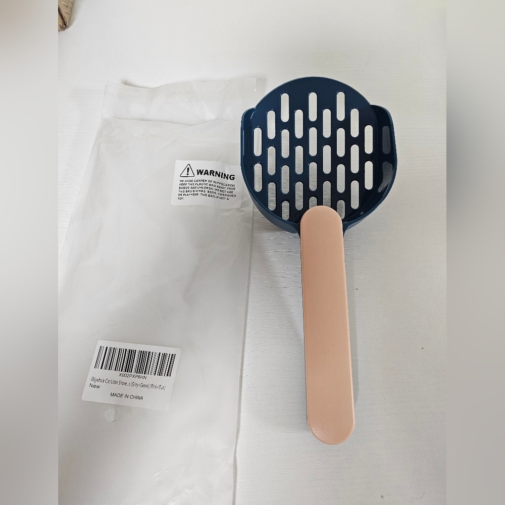 New‎ cat scooper